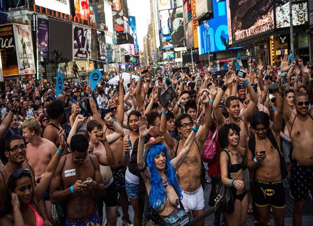 Bunch Of Peeps In Various States Of Undress Crowding Times Square NYC..