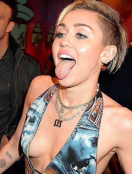 Miley Cyrus sexy posing at MTV Europe Music Awards