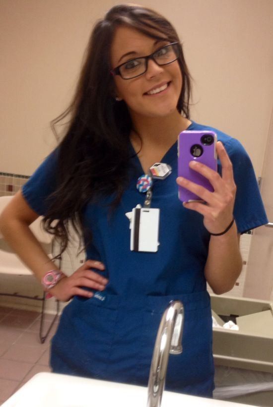 Cute nurse in scrubs