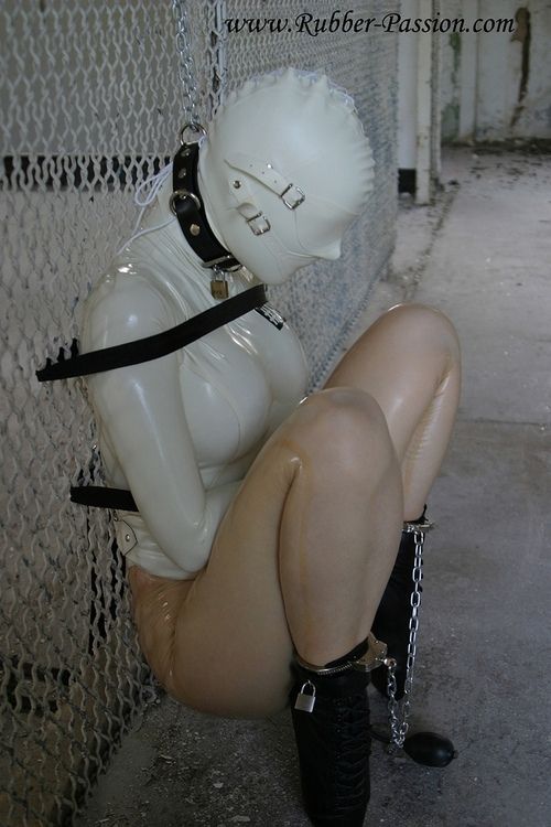 Latex slave waiting for your cock