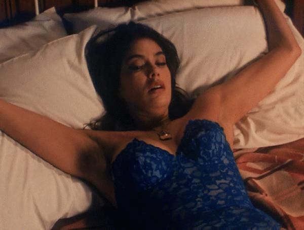 Teri Hatcher bound to bed in blue lingerie - close