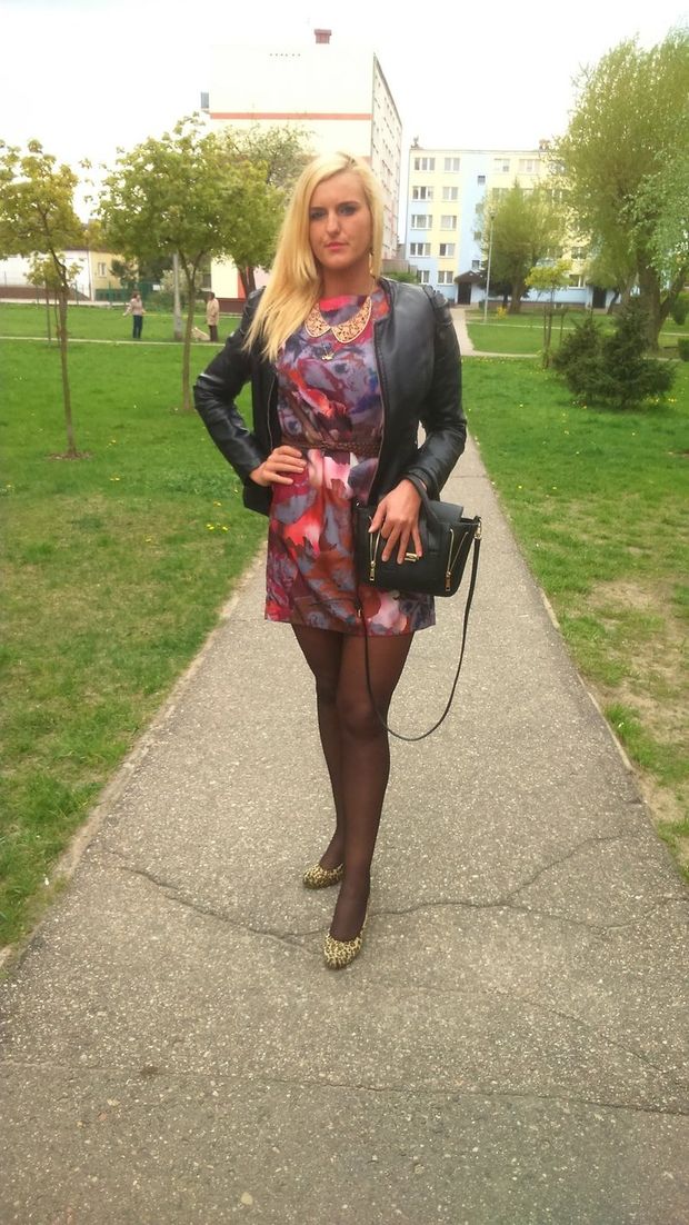 Blonde bimbo outdoor in short cheeky dress