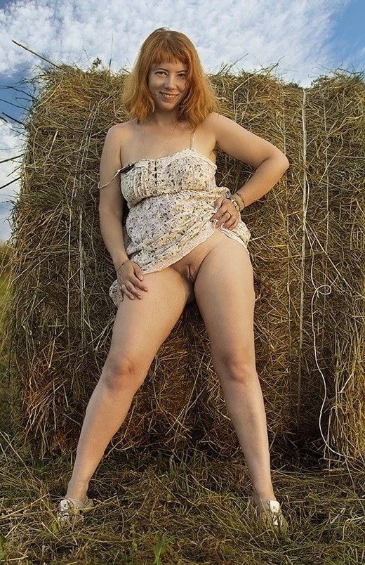 Behind the hay bale