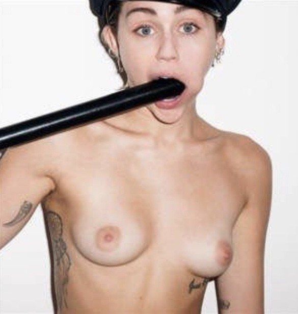 Miley loves her big black baton