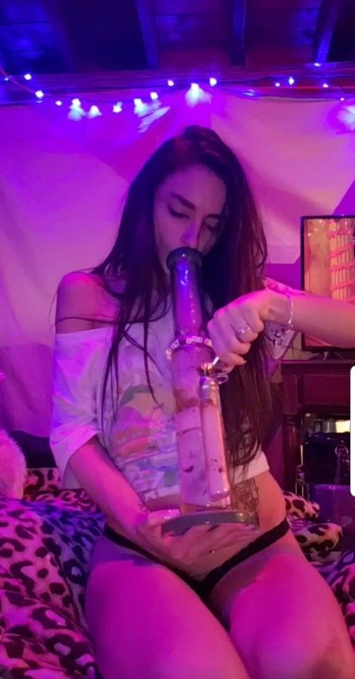 bong hit in pink light