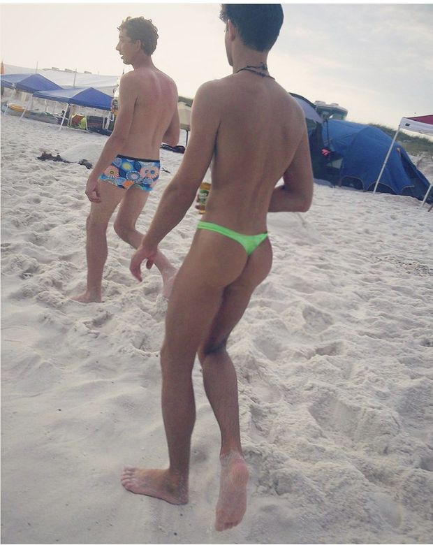 Twink wearing a thong at the beach