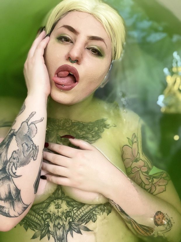 sexy alt woman with a split tongue