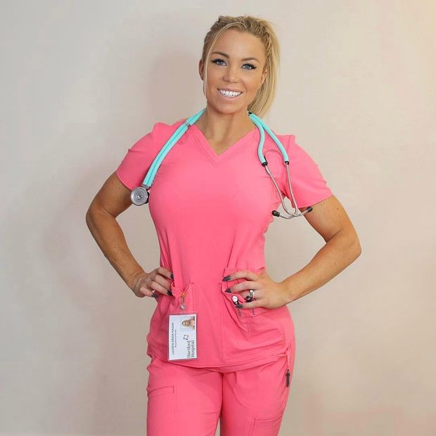 Hot nurse in pink scrubs