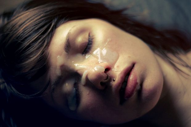 Sleeping beauty with cum on her face