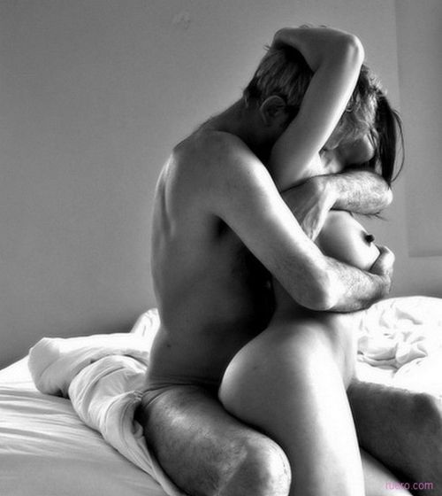 Nude couple in erotic embrace