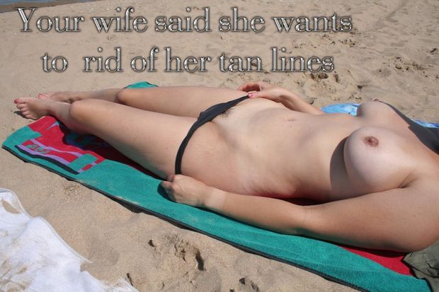 Wife tanning on beach