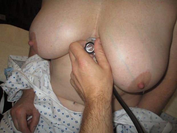 Listening to Busty patient’s heartbeat with stethoscope from Doctor’s POV