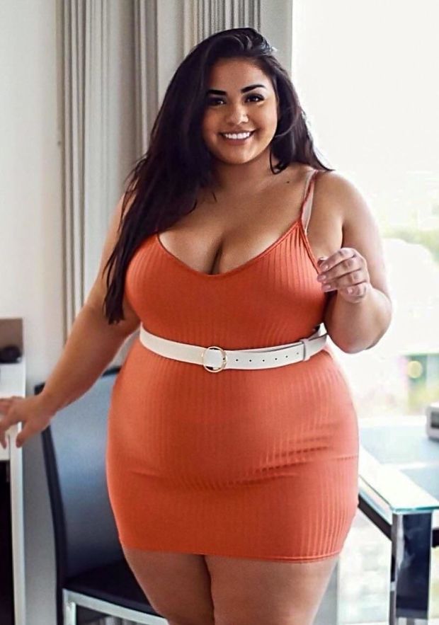 Diana Sirokai In A Tight Orange Dress