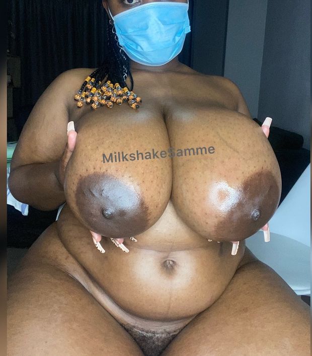 Milkshake Samme cupping her big breasts