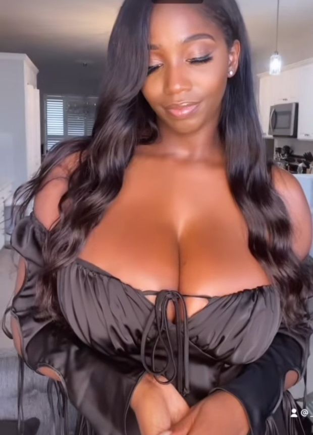 Ellie Mae amazing cleavage black tie top