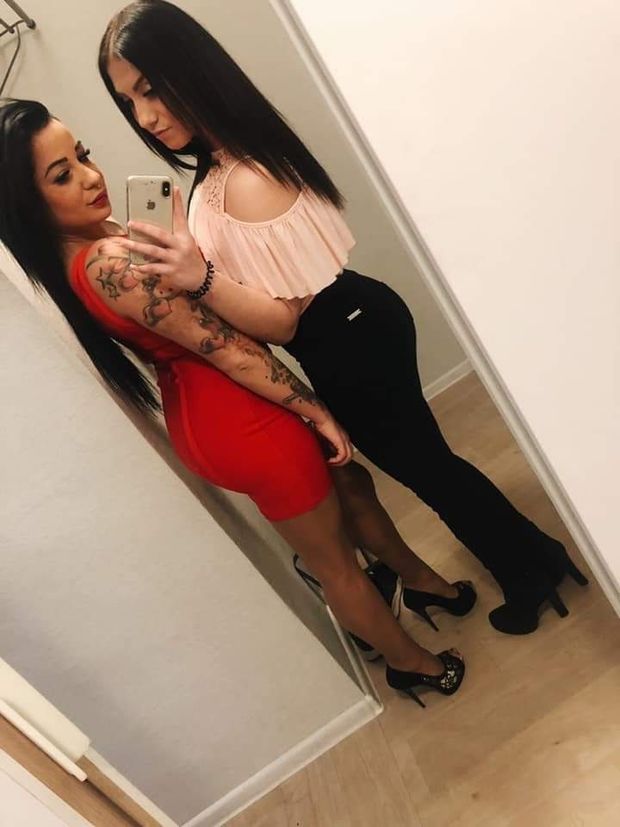 Angelika and her friend pose sexy