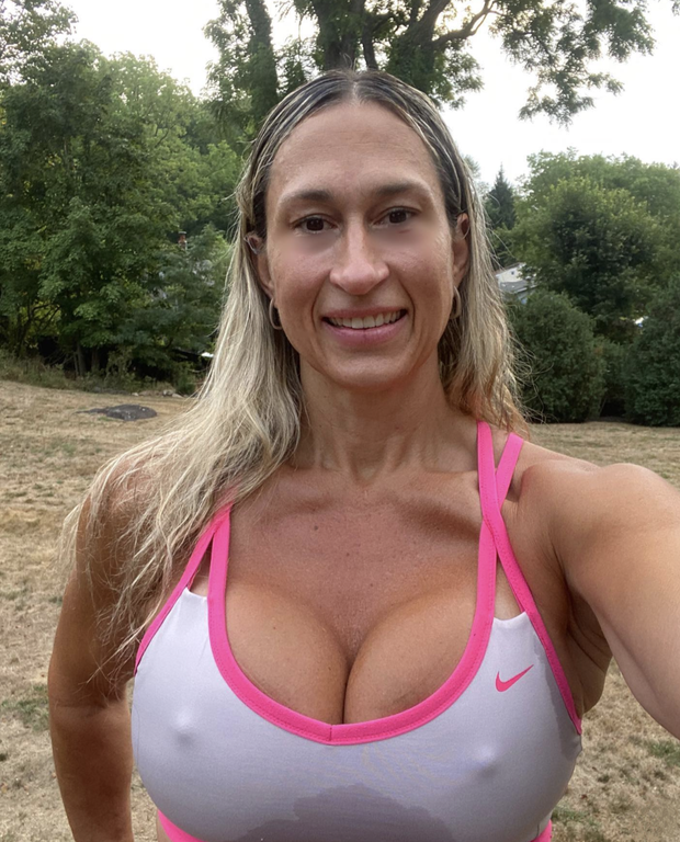 Fit woman showing off her rock hard sexy nipples