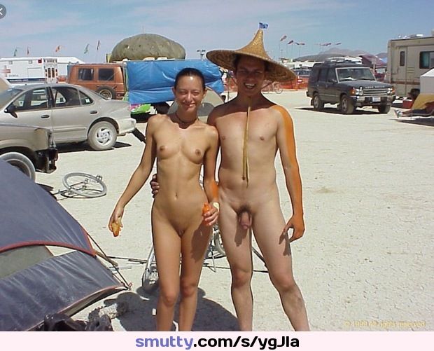 Nude couple enjoys Burning Man.