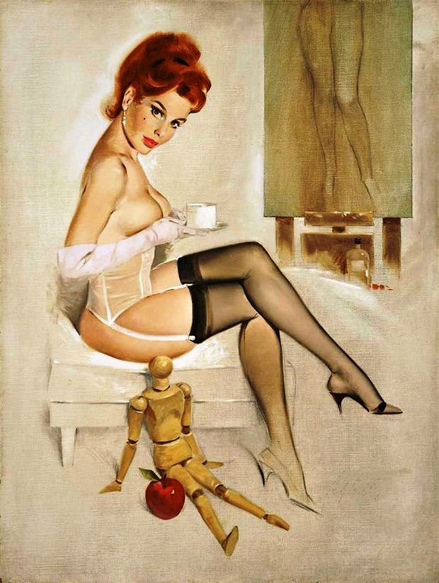 Sexy redhead burlesque dancer having a cup of coffee.