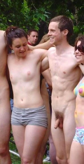 Sister looks at brother's dick on nude beach