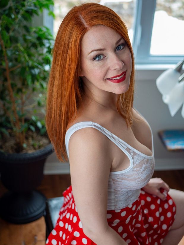 Redhead Chloe Morgane in a lace white cami