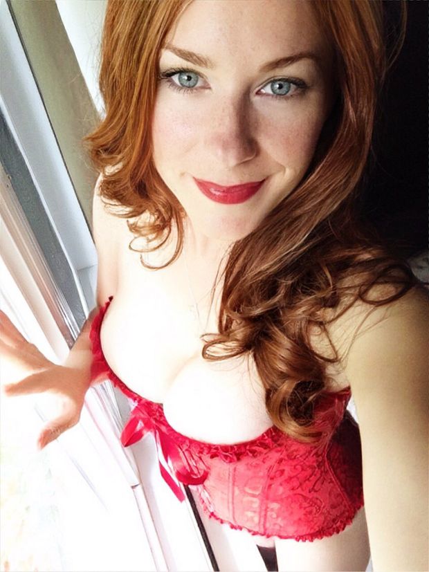 Redhead Chloe Morgane in a red corset