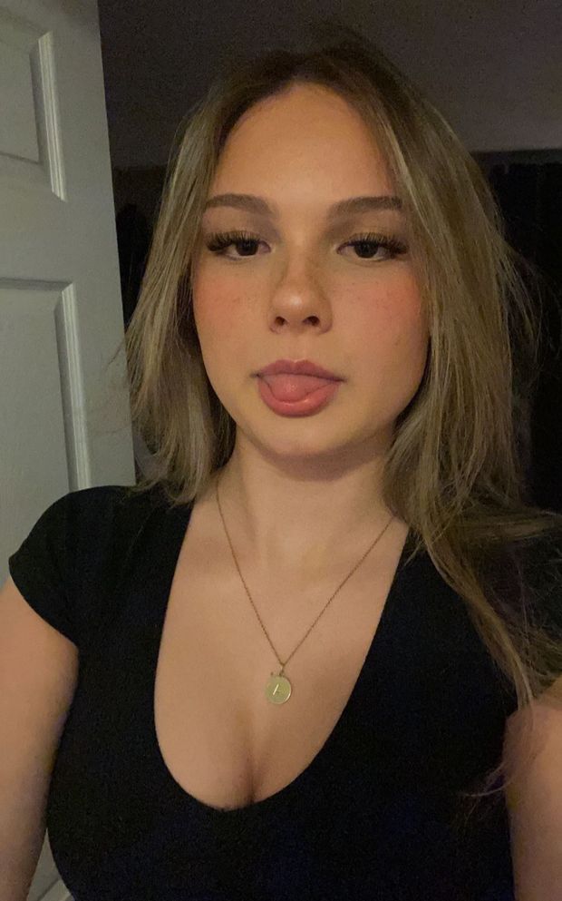 Ashley tongue out cleavage selfie