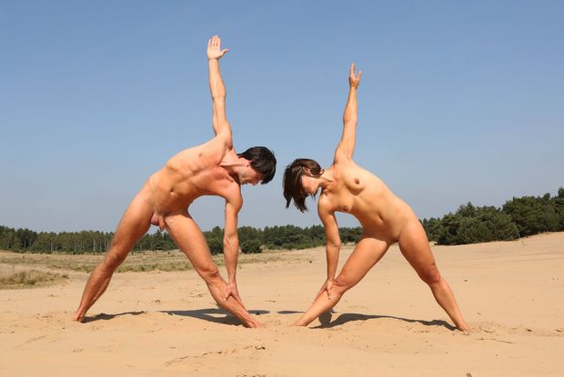 Nude yoga at the beach